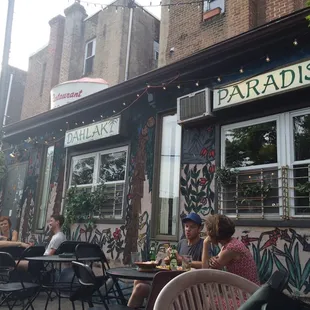 Cute if slightly grungy patio! They turn on the string lights after it gets dark.