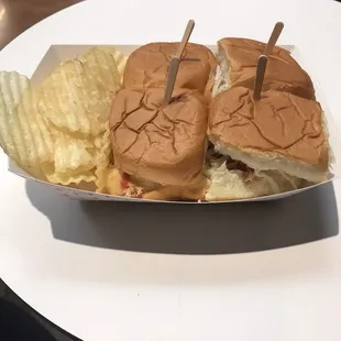a sandwich and potato chips