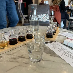 a tasting table with glasses of wine