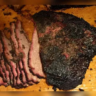 our brisket point... nice smoke ring and bark. juicy and full of flavor.