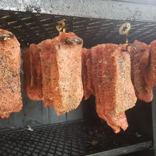 Hanging beef jerky on Dah Pit