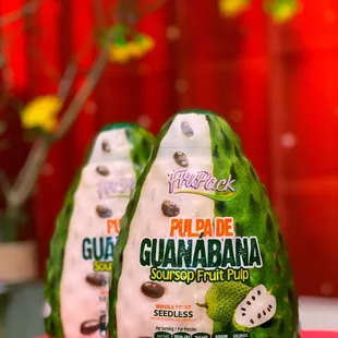 two guanabanas on a table