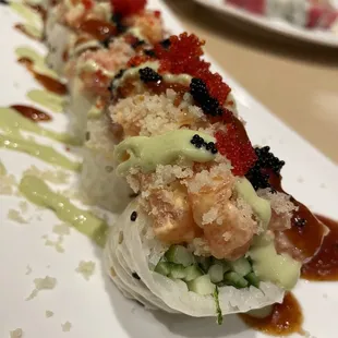 a sushi roll on a white plate