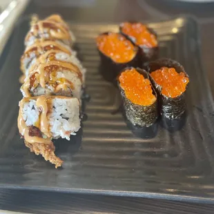 a close up of a plate of sushi