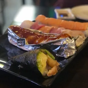 a close up of a plate of sushi