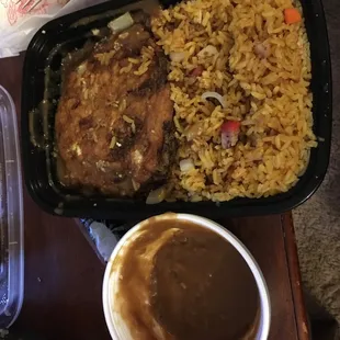 Chicken Egg foo young combo plate with pork fried rice. Two patties of egg foo young, gravy came on the side.