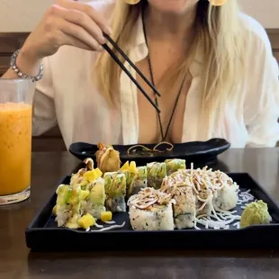 woman eating sushi