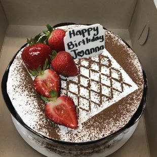 Custom tres leches cake for a special occasion.