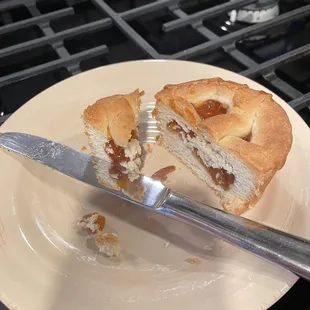 a half eaten sandwich on a plate