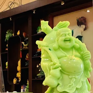 Large Buddha Statue on the counter where you pay. The old legend says that if you rub his stomach and make a wish it will come true.