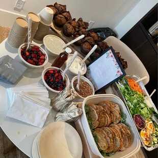 a table full of food and drinks