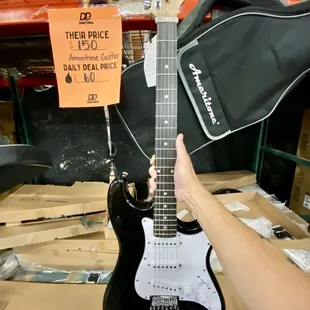 The guitar is a little short. Must be junior size.