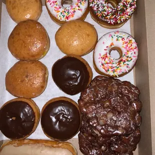 a variety of doughnuts in a box