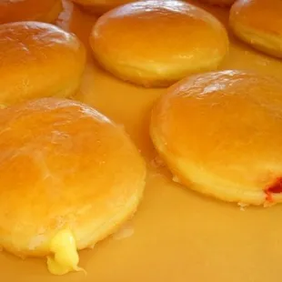 a bunch of doughnuts on a plate
