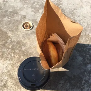 Chocolate bar (aka Long John, glazed donut, and medium coffee