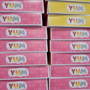 a stack of boxes of donuts