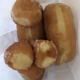 Maple frosting donut. Glazed donut. Donut holes.