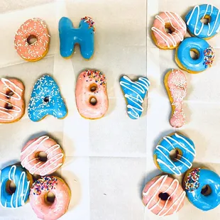 Gender reveal. Letter donuts