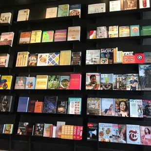 Bookshelf behind the register