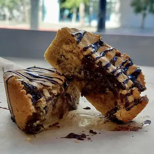 a chocolate chip cookie with a bite taken out of it