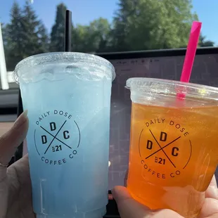 two drinks in plastic cups