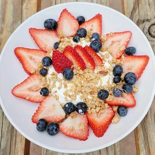 strawberries, blueberries, and granola