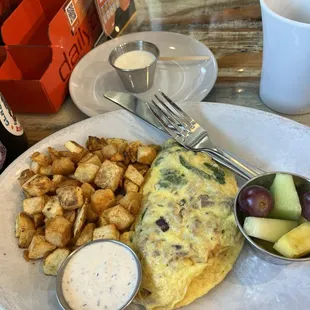 Turkey sausage omelette, potatoes, fruit