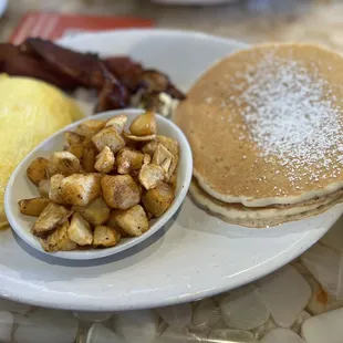 Pancakes, potatoes, &quot;scrambled eggs w/ cheese &amp; bacon