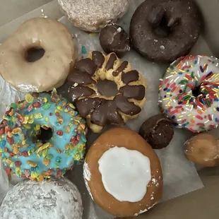 a variety of donuts in a box