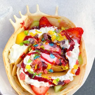 Tropical Vacation Crepe Cone with wild strawberry swirl gelato!