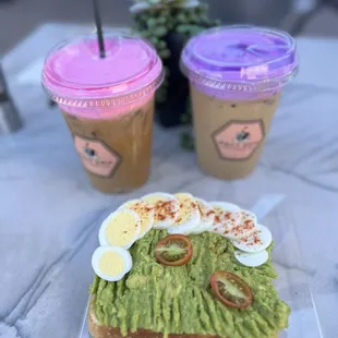 Egg &amp; Avocado Toast + lattes with colored cold foam