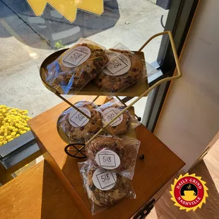 three trays of cookies on a table