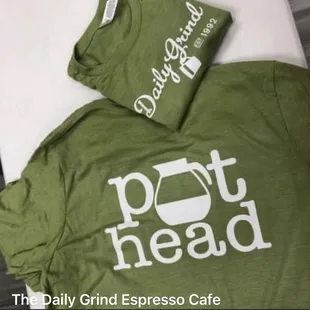a pot head t - shirt on a table