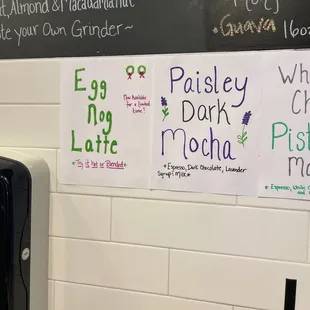 a variety of menus on a wall