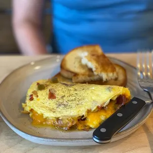 Three egg omelette with ham and cheddar.