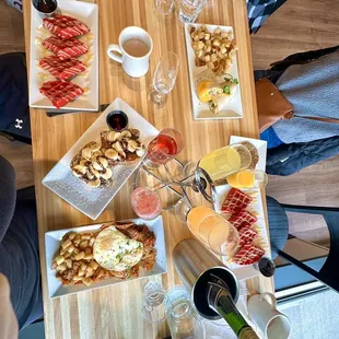 French Toast Bananas Foster, Red Velvet Waffles, Chilaquiles, Chipotle Burrito, Mimosa Flight