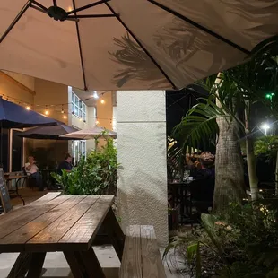 Quaint and warmly lit, well landscaped outside area