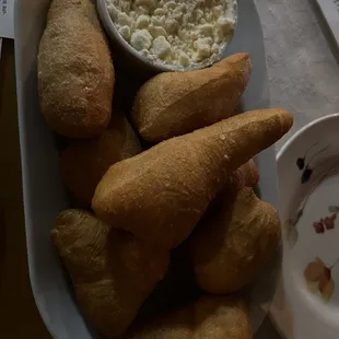 See!?! Fried dough with sour cream and feta cheese dip sauce.
