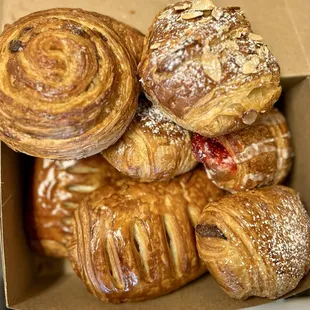 Raisin roll, almond croissant, Nutella croissant, apple croissant, strawberry and cream cheese croissant, strawberry croissant