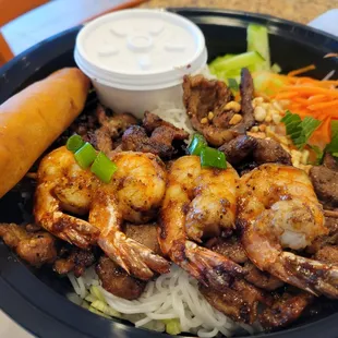 Vermicelli with grilled pork, shrimp, and eggrolls