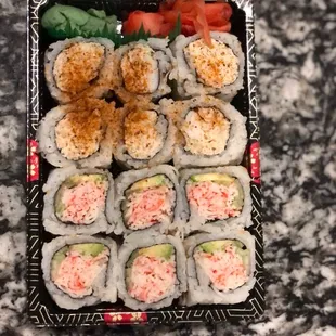 a tray of sushi rolls