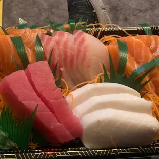 This is a E7. Sashimi Special minus one piece of salmon and one piece of tuna because I couldn't wait.