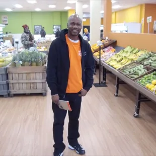 a man standing in a grocery store