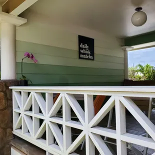 The outdoor seating area with signage