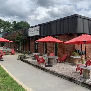 tables and umbrellas outside a restaurant