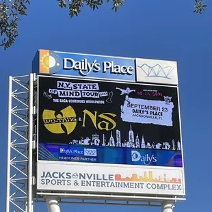 a sign for a sports and entertainment complex