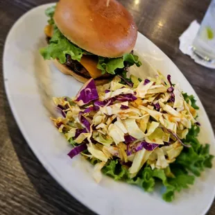 Monday night football deal. 1/3 lbs. Burger, a side (cole slaw), and a well drink or beer for $15.99.  Delicious Burger!