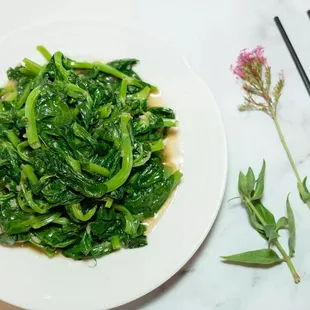 Stir fried garlic pea leaf
