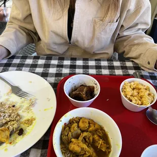 curry chicken, beans and peas, Mac and cheese, lavender coconut lemonade and a small taste of the oxtail.