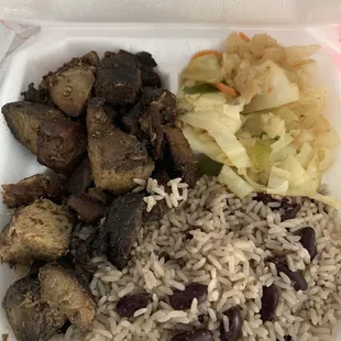 Jerk pork without the jerk sauce, cabbage, and rice and beans